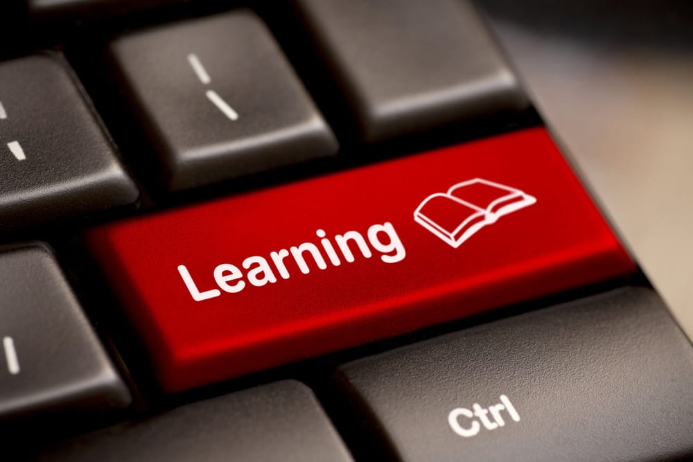 keyboard key that says learning